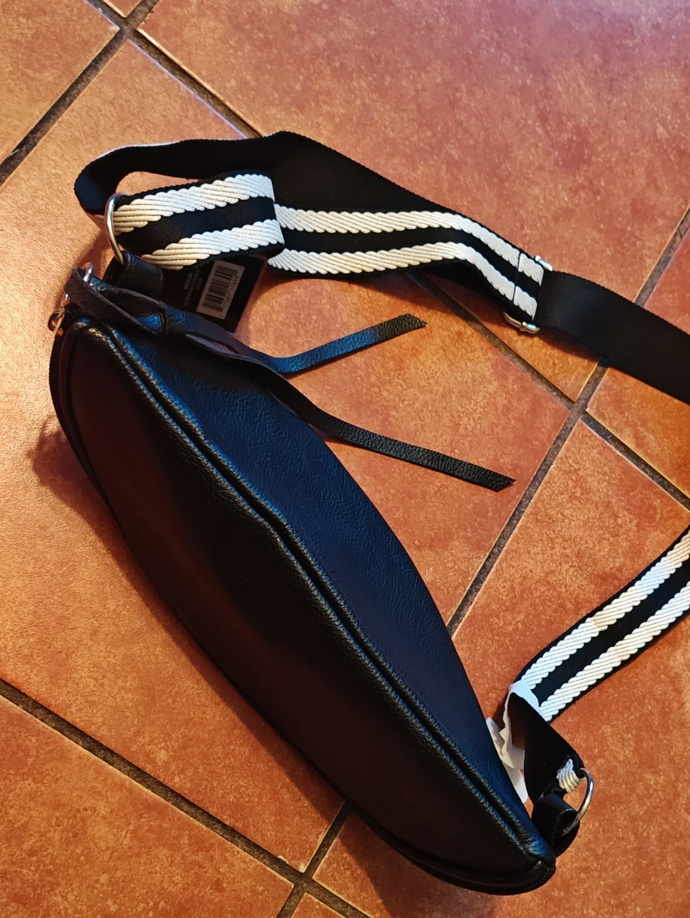 Ulta Beauty Black Leather Crossbody Belt Bag with Black-and-White Striped Strap